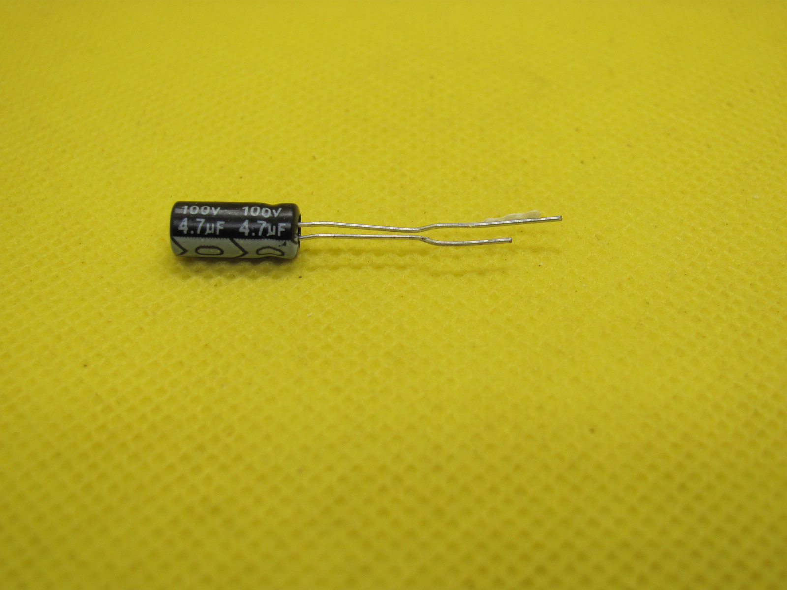 15312230165-4-7uf-100v